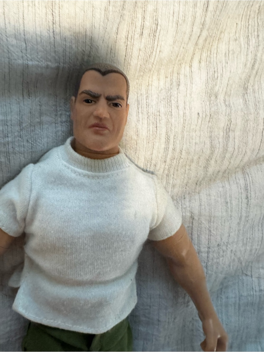Vintage Male Action Figure with White Tee and Olive Pants